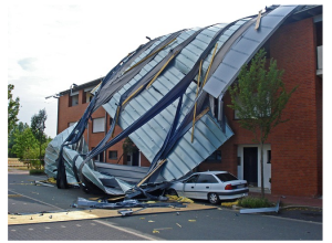 storm damaged commercial metal roofing in St Paul