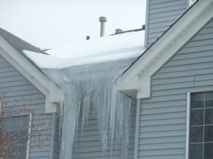 Ice dam build up on apartment complex in Minneapolis
